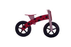 GÅCYKEL  RÖD M. SVARTA FLÄCKAR TRÄ